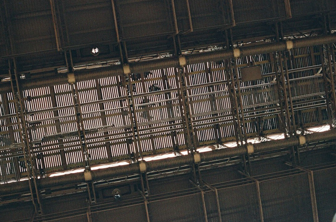 Studio lighting rig with spotlights on an overhead grid